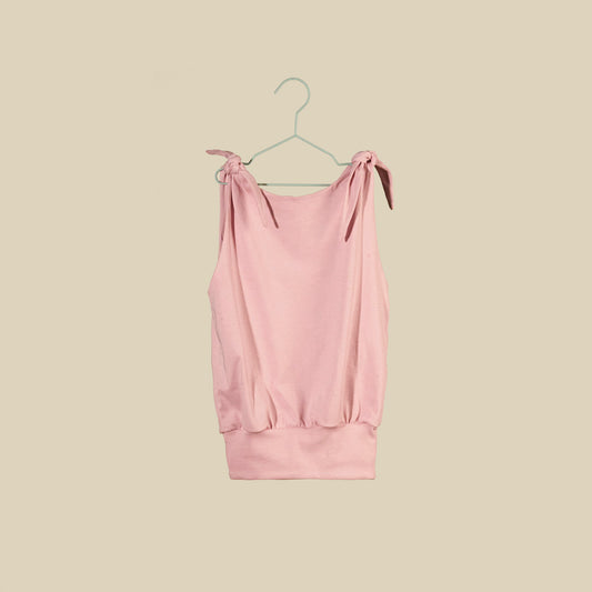 Top o mini abito rosa chiaro senza maniche con nodi