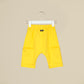 Shorts baggy in tuta gialla con tasconi