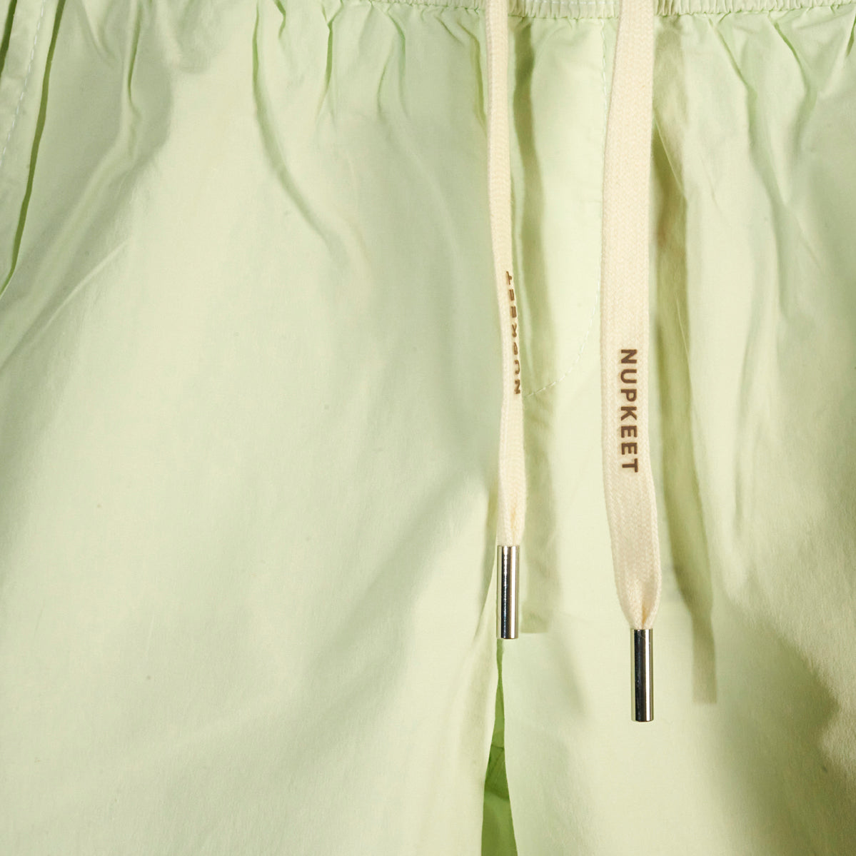 Shorts color lime in tessuto parachute