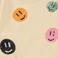 Felpa panna con smile in paillettes