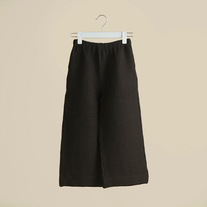 Pantalone nero in tessuto cannetté gamba larga