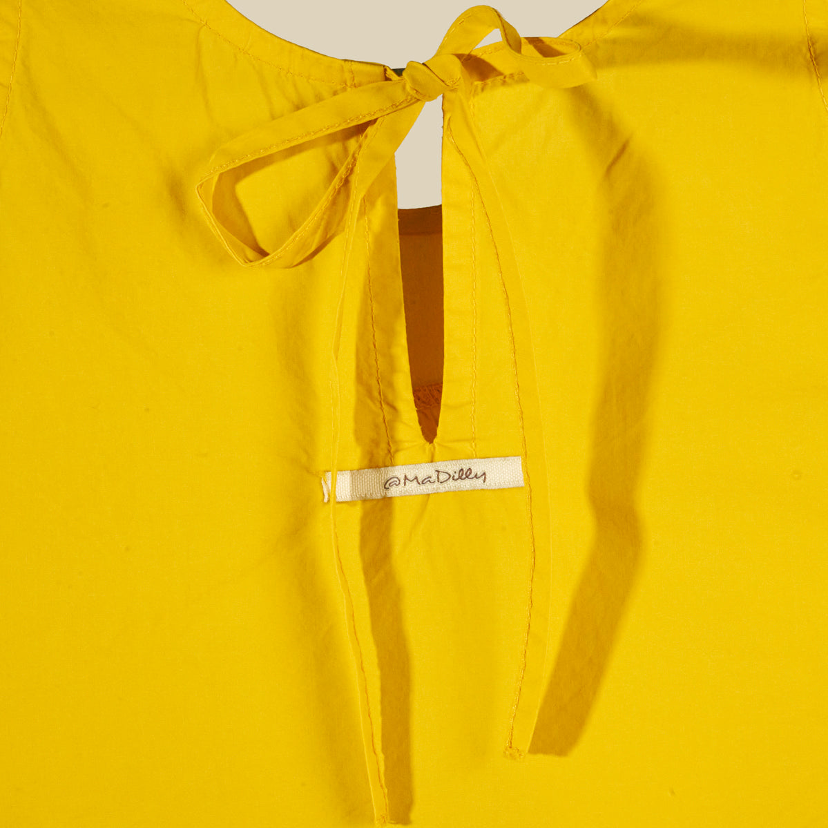 Vestito smanicato in cotone croccante giallo girasole