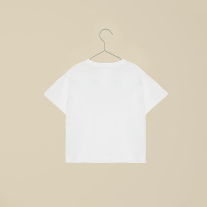 T-shirt bianca a maniche corte con scritta "Life is a playground"