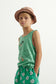 Shorts verdi con dadi