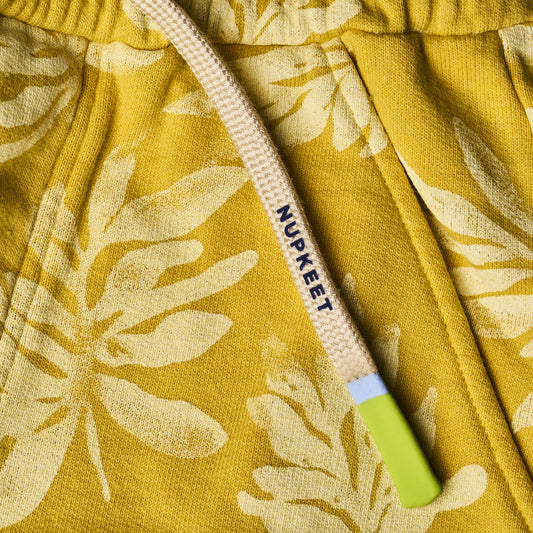 Shorts felpati con stampa foglie