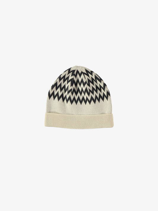 Cappellino in cotone bianco con disegni zigzag neri