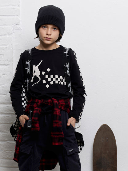 Cappellino tricot in cotone nero con scritta nascosta